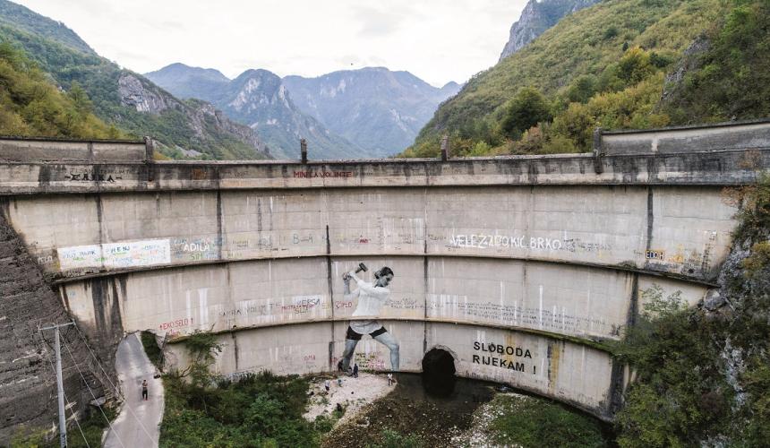 Built in 1959, the Idbar Dam cracked soon after its construction. Investors and construction crews had ignored multiple warnings from the locals not to underestimate the force of the Bašćica, a river known to be unpredictable and fast-flowing. Idbar was decommissioned soon after it was constructed, when the river began fracturing the dam, allowing the Bašćica to flow freely again. Konjic, Bosnia and Herzegovina. © Andrew Burr