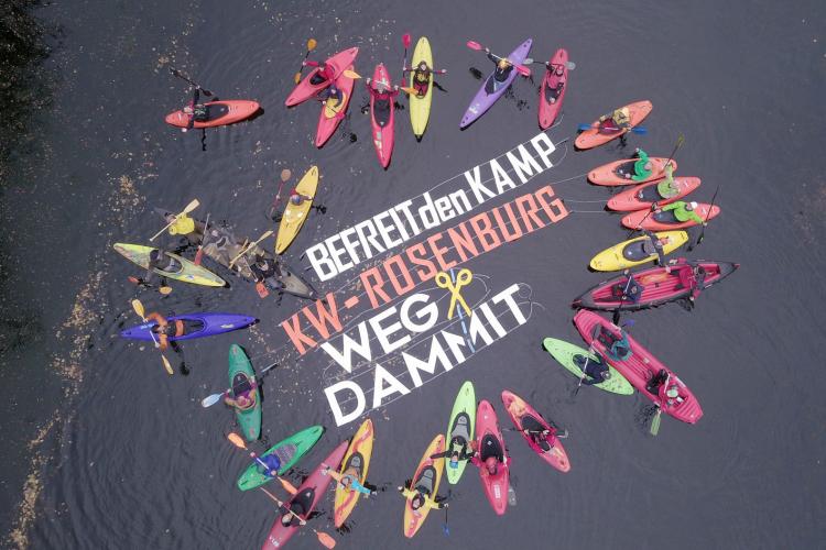 Protest action at the dam Rosenburg on the Kamp river in Lower Austria. The floating letters say “Free our rivers. HPP Rosenburg – Get rid of it” © Riverwatch