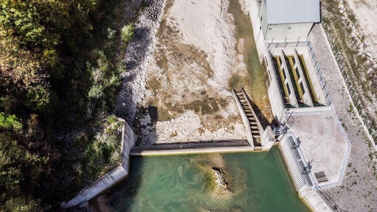 The Ugar in Bosnia-Herzegovina was a pristine mountain river where large Huchen spawned every spring. Now, two Kelag power plants drain most of the water and the Huchen are gone. © Amel Emric