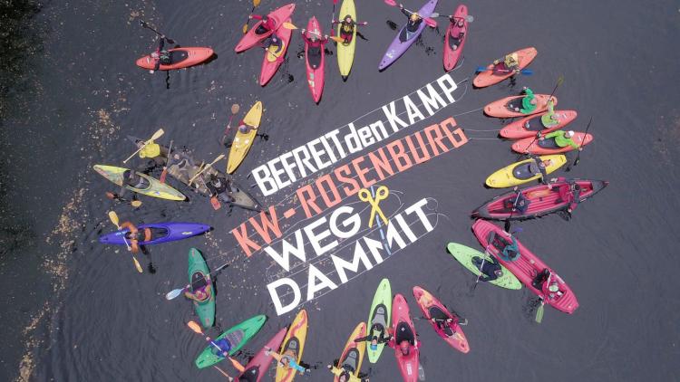 Protest action at the dam Rosenburg on the Kamp river in Lower Austria. The floating letters say “Free our rivers. HPP Rosenburg – Get rid of it” © Riverwatch